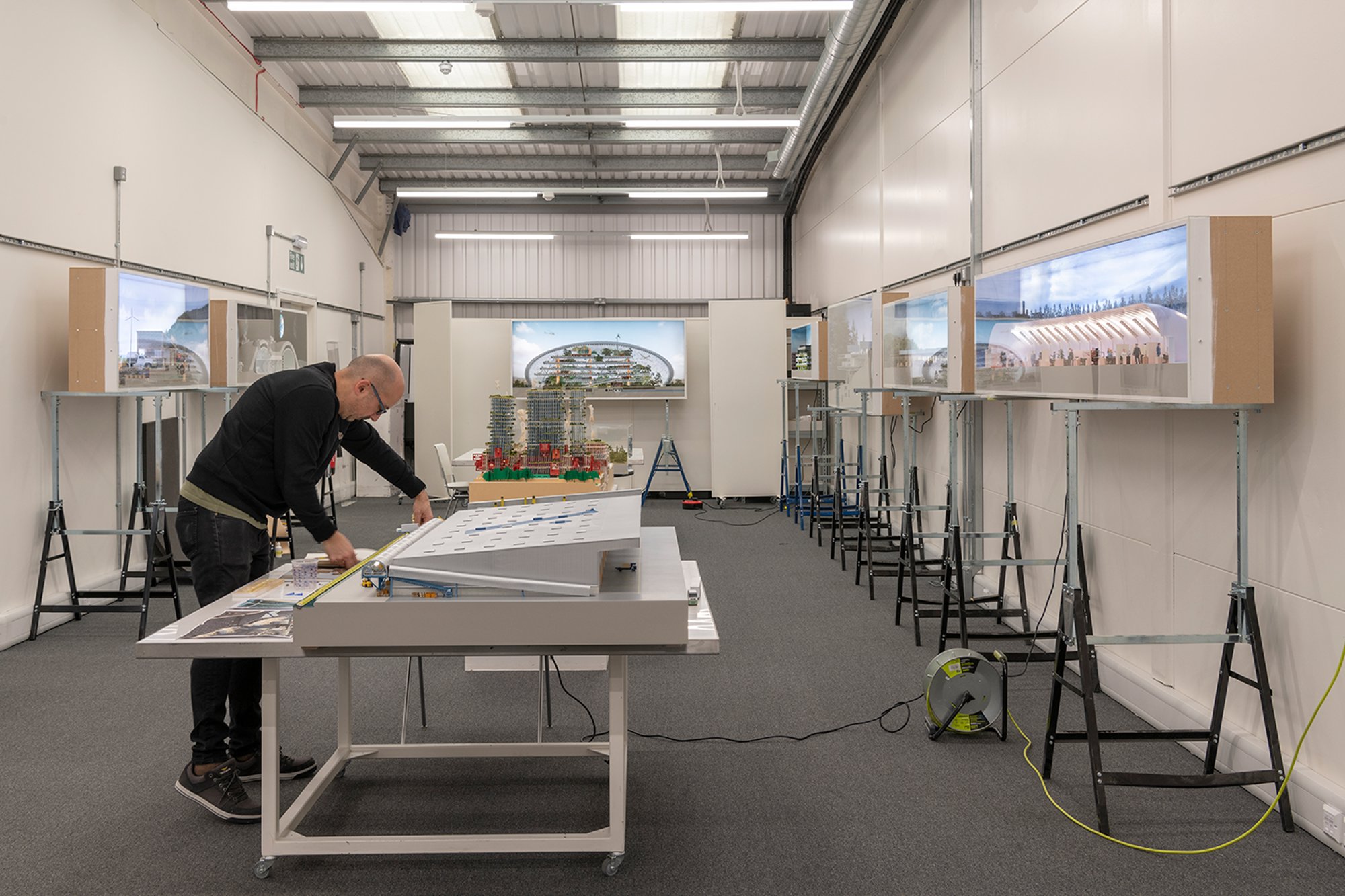 Making dioramas for the exhibition, in the practice’s London workshop. The word diorama literally means, ‘small scale replica of a scene.' These detailed sectional models of early projects such as Climatroffice and the Willis Building, show the practice's pioneering systems approach to architecture. They were created for the exhibition at the Centre Pompidou, with input from the practice's in-house environmental engineering and sustainability teams.